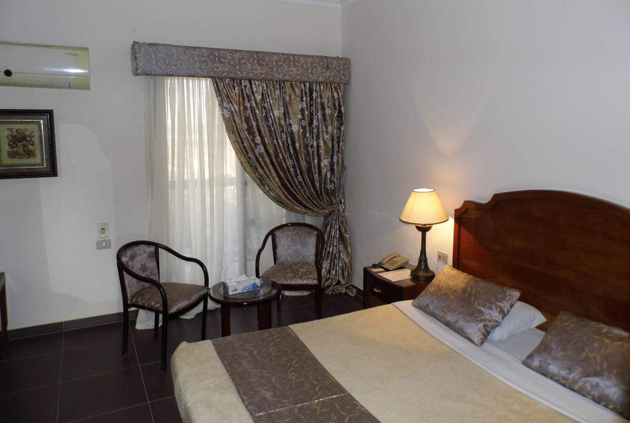 Mg Nefertiti Hotel Al Minya Phòng bức ảnh
