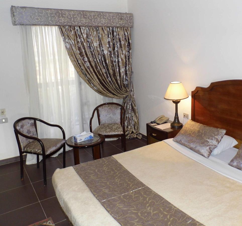 Mg Nefertiti Hotel Al Minya Phòng bức ảnh